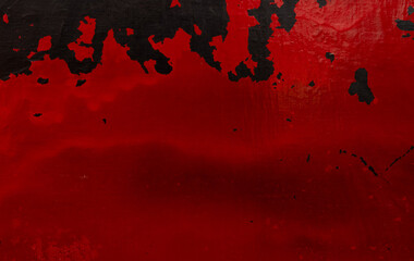 Rusted steel and red peeling paint,Peeling paint on metal wall.Red texture of old cracked flaking...