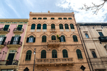 Fototapeta na wymiar Facade of old classic buildings in Palermo, Sicily, Italy