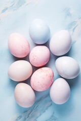 Easter eggs in pink marble, pastel blue background. easter concept.