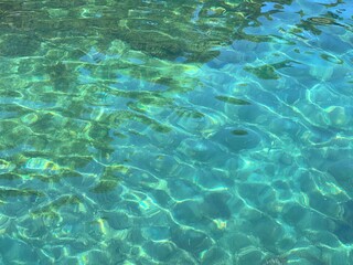 Fototapeta na wymiar Sea clear turquoise blue water beautiful surface.