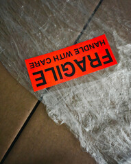 Moving boxes with fragile sticker on a background - 739461033