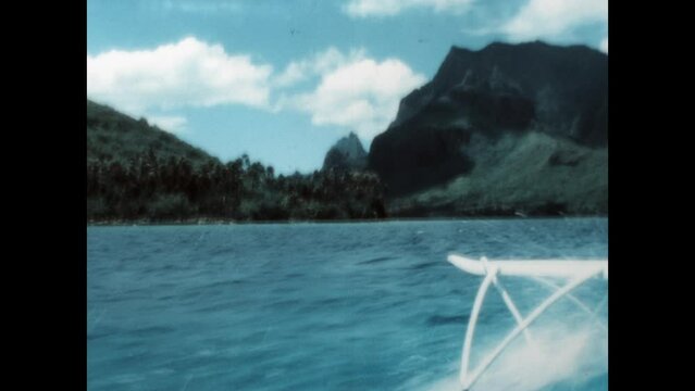 Outrigger to Moorea-Maiao 1971 - The island of Moorea-Maiao, in French Polynesia near the island of Tahiti, is seen from an outrigger boat as it travels near the shore, in 1971.