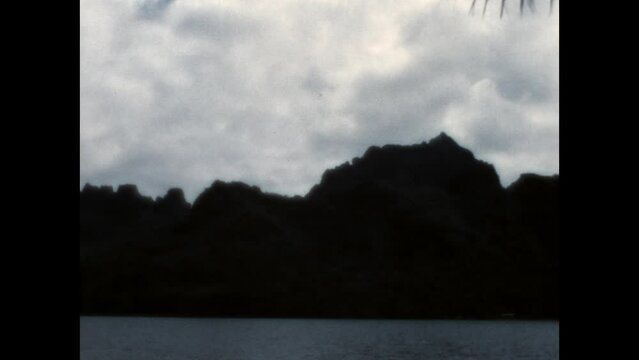 Mount Tohoviea Silhouette 1971 - Mount Tohivea, on the island of Moorea-Maiao in French Polynesia, is silhouetted in the fading light, seen in 1971. 