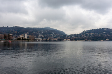 Panoramic view of the Como Lake in a cloudy day