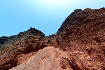 Detail of the red cliffs on the path to the Red Beach (Kokkini Paralia). Greek Islands, Santorini, European Vacation