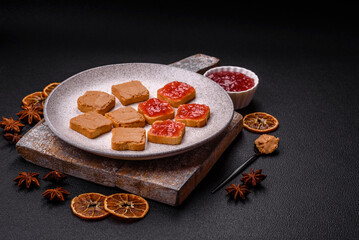 Delicious nutritious sandwiches with peanut butter, strawberry jam