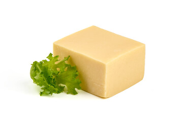 Gouda cheese block, close-up, isolated on white background.
