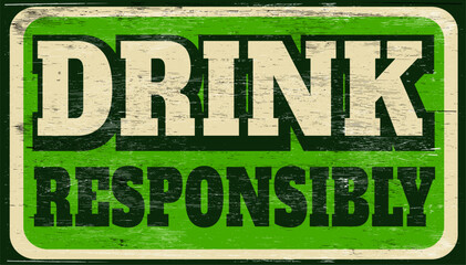 Vintage drink responsibly sign on wood