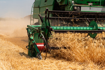 Close up of combine harvester for harvesting wheat.