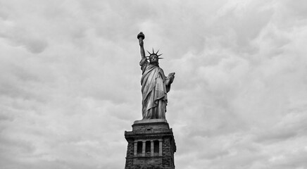 Statue of Liberty on the background of sky, New York City. Black and white image. - 739501804