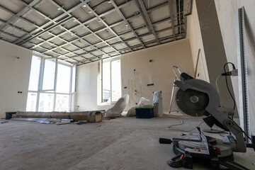 The metal frame of the ceiling, sound insulation, in the process of repairing an apartment
