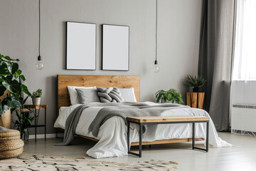 Minimalist style double bed bedroom wall art mock up. Light grey painted walls and blank wall art posters.