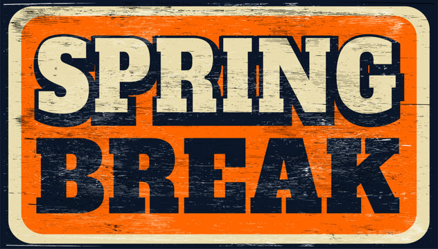 Old and worn retro spring break sign on wood