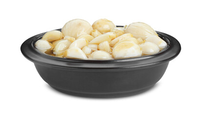 Peeled garlic cloves with honey in bowl isolated on white