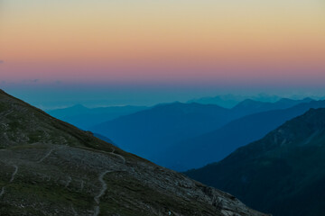 Panoramic sunset view of majestic mountain peaks in High Tauern National Park, Salzburg Carinthia...