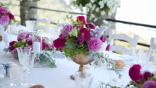 Indulge in the romantic ambiance of an Italian villa adorned with exquisite wedding decor. This stock footage captures the charm and elegance of a dreamy celebration amidst the scenic beauty of Italy.