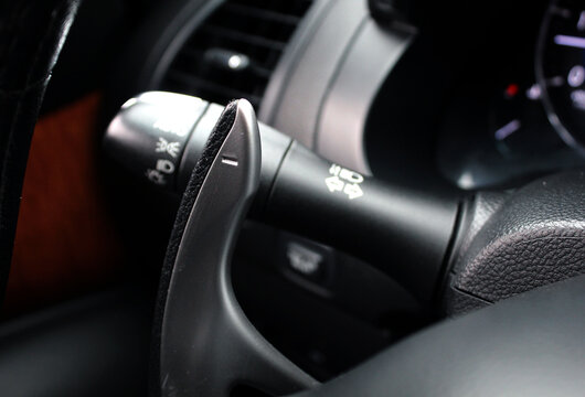 Gear shift paddle on steering wheel. Gear levers in the steering wheel. Steering Wheel Paddle Shifters.