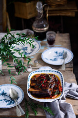 red wine cranberry braised short ribs.selective focus.style rustic.