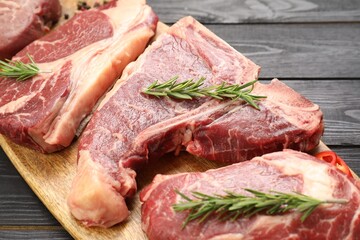 Pieces of raw beef meat on table, closeup