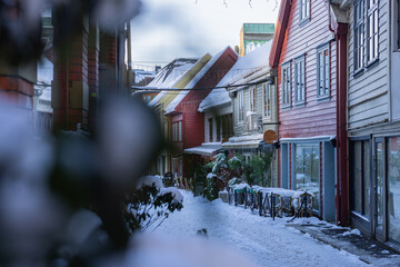 Detail view of alley with houses at  Bergen City in Norway. Picturesque houses on a small slope on...