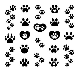 Fototapeta premium Dog or cat paw print. Silhouette Image. Animal footprints. Hand drawn style. Vector drawing. Collection of design elements.