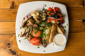 Grilled vegetables with tahini sauce