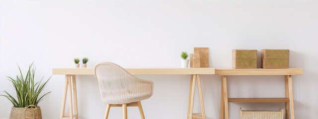 Minimalistic home office interior with wooden desk, wicker chair, plants and storage boxes. - obrazy, fototapety, plakaty