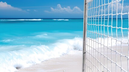 Beach volleyball net against turquoise waters