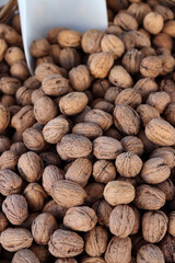 Close up of unshelled walnuts