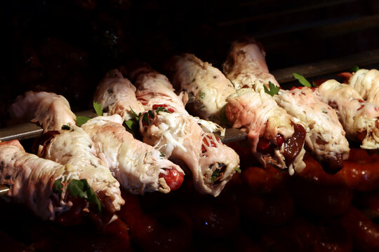 Gnummareddi, torcinelli or fegatini, rolls based on lamb offal (liver, lung and kidney), a food specialty typical of Southern Italy - Italian food