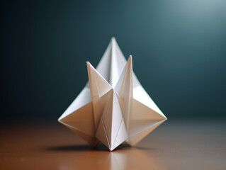 Extreme close-up of a simple, geometric paper origami figure.