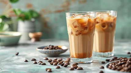 Fototapeten Ice coffee with cream in a tall glass and coffee beans, portafilter, tamper and milk jug © Vasiliy