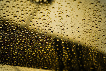 Golden background with droplets. Abstract background. 