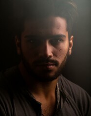 Obraz premium Moody portrait close-up of a attractive young man