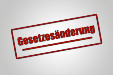 Gesetzesaenderung. Eine rote Stempel Illustration isoliert auf hellgrauem Hintergrund.