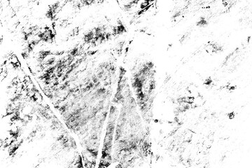 Black and white grunge background. Abstract monochrome texture of cracks, scuffs, chips, dust