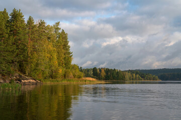 Fototapeta na wymiar Lake Ladoga near the village Lumivaara on a sunny autumn day, Ladoga skerries, Lakhdenpokhya, Republic of Karelia, Russia