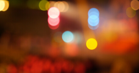 Colorful Bokeh abstract blurred background music festival stage show performance party. Vibrant...