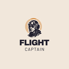 Illustration of pilot helmet,flight captain logo,Flight academy vector round emblem © keenan