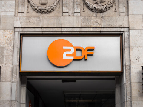 BERLIN, GERMANY - 7. February 2024: ZDF logo sign on the building exterior wall of the Zollernhof at the Unter den Linden street. Television production studio and offices of the media company.