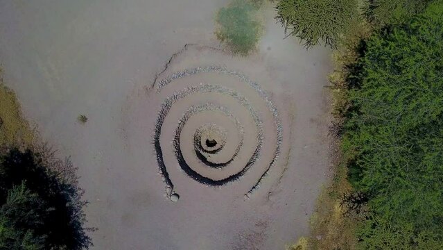 The Spiral Cantalloc Aqueducts Spiral of Nazca, Peru. Aerial Top Down Shot Slowly Entering