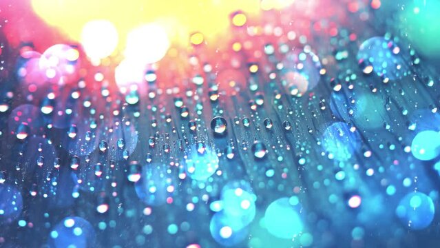 rain drops background. rain drops in window with colorful reflection. seamless looping overlay 4k virtual video animation background 