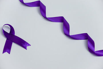 purple ribbon on a white background