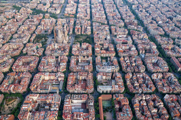 Aerial wide angle view of Barcelona Eixample residencial district, Spain. Urban grid with streets and buildings