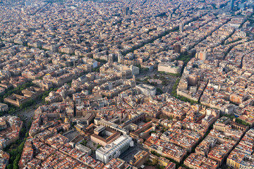 Aerial high angle view of Barcelona old town buildings, Spain. Late afternoon light