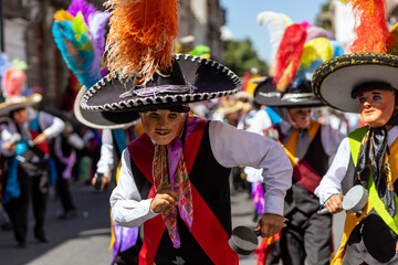Mexican carnival, Mexican dancers recognized as "huehues" with bright typical Mexican costumes in Mexico