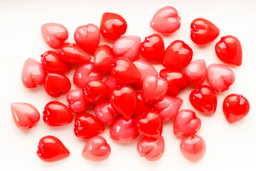 Colorful candies in heart shape. Valentines day background.