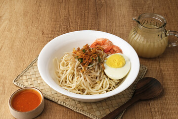 Mie Celor, a noodle dish from Palembang, South Sumatra, Indonesia. Served in a thick and savory shrimp broth with complements such as eggs, shrimp, bean sprouts, and celery.
