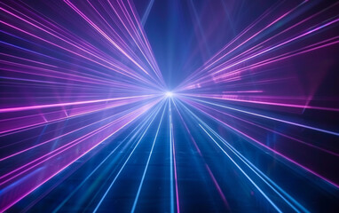 Blue and violet beams of bright laser light shining on black background