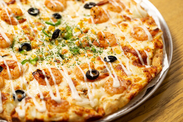 pizza on a wooden table